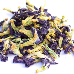 Dried butterfly pea flowers on a white background