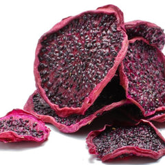 Dried red dragon fruit slices close-up