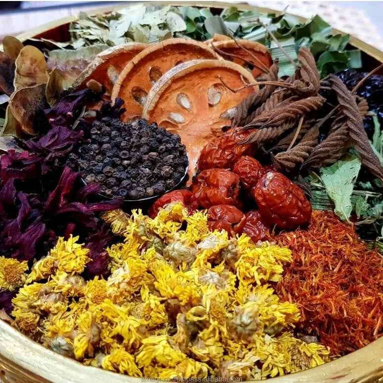Assorted dried herbs and spices in a woven basket