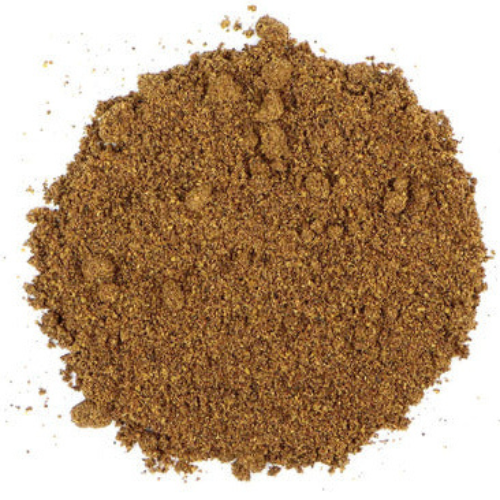 Brown spice powder on a white background