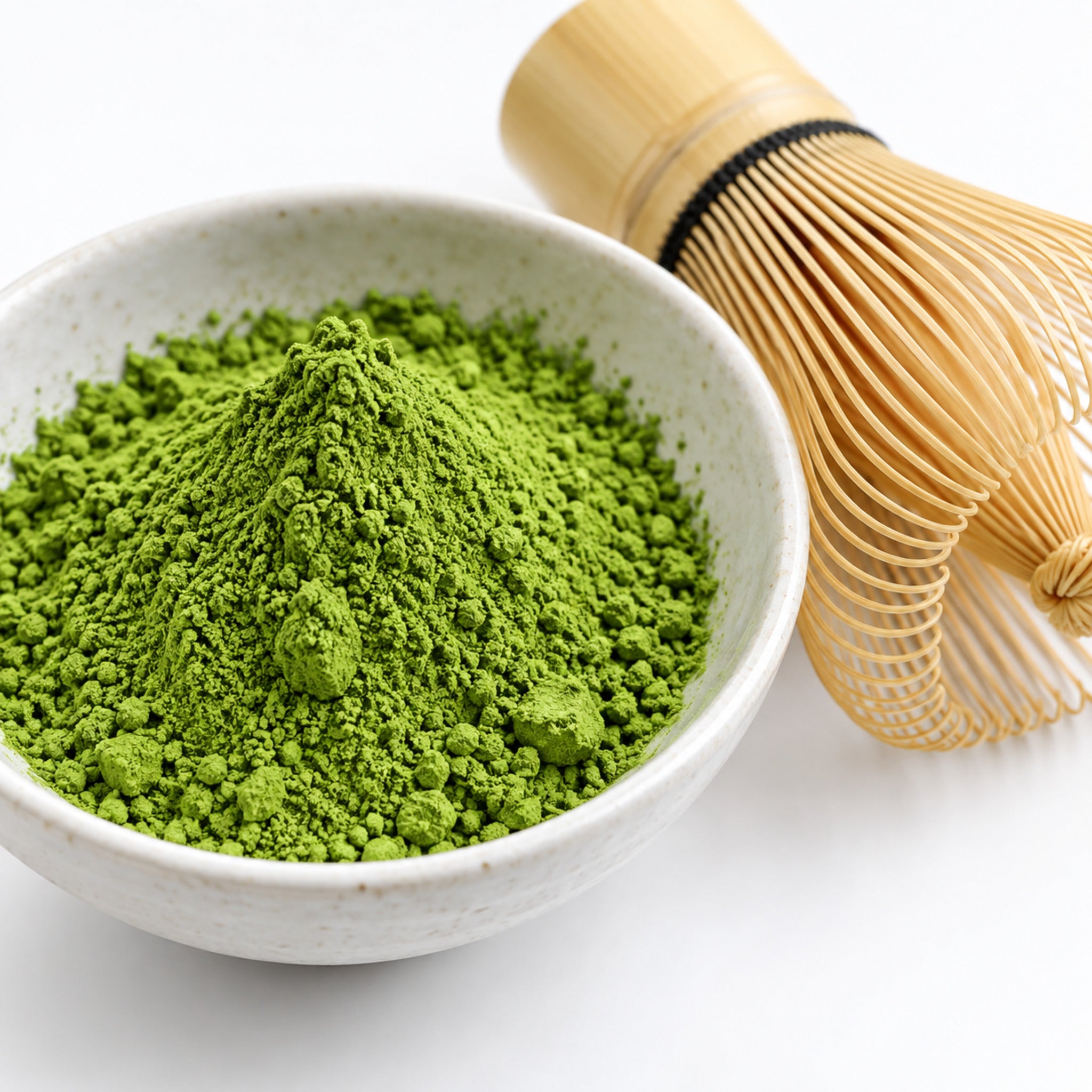 Matcha green tea powder with traditional bamboo whisk