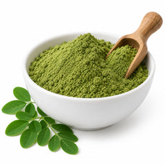 Moringa oleifera leaf powder in a ceramic bowl